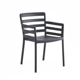 Lovisa Plastic Outdoor Chair in grey featuring UV-protected and weather-resistant plastic, versatile design for patios, gardens, decks, balconies, and sunrooms, offering durable and modern outdoor seating.
